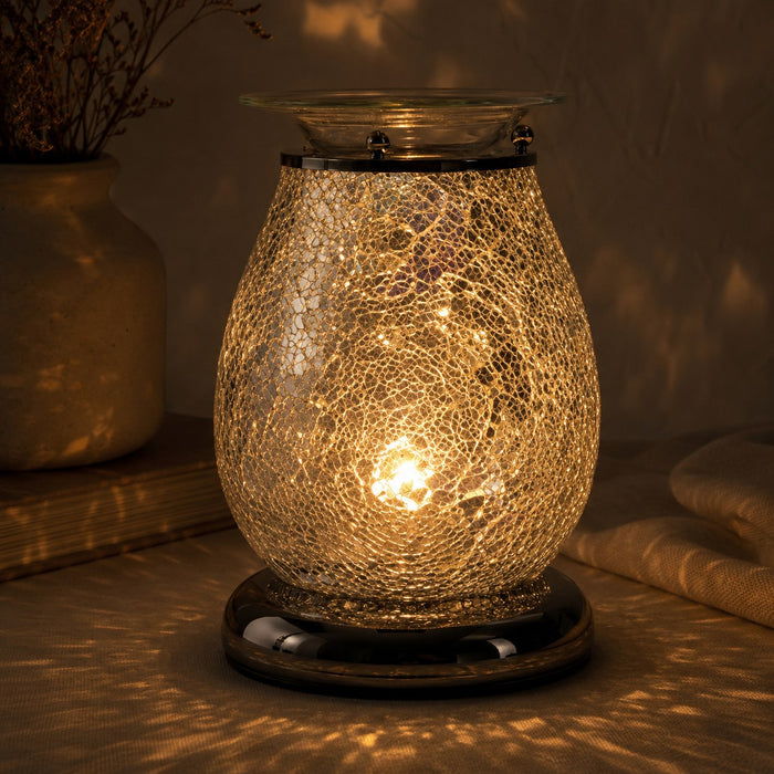 Glitter Star Electric Wax Melt Burner lit in the dark