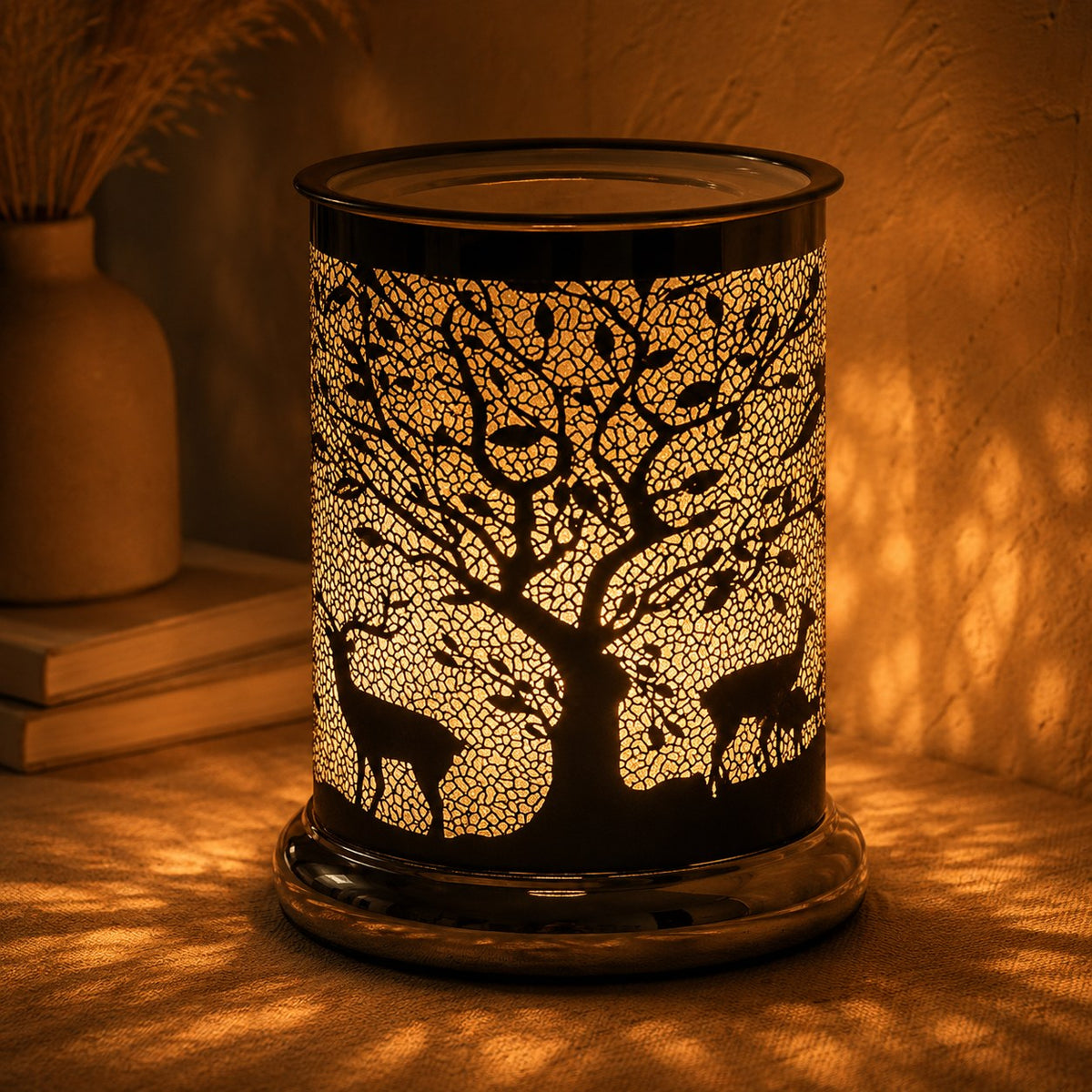 Stag silhouette burner lit at night
