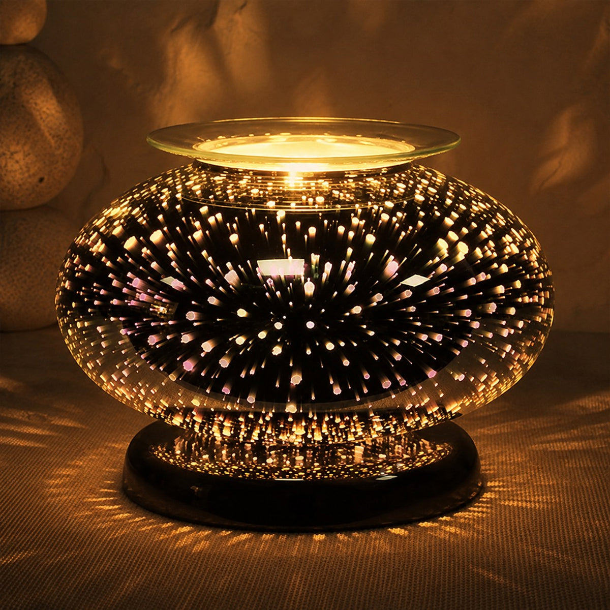 3D burst ellipse burner lit at night