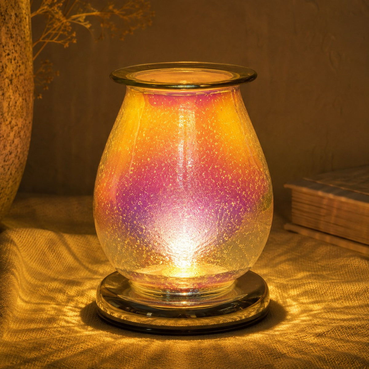 Waterdrop white burner lit at night