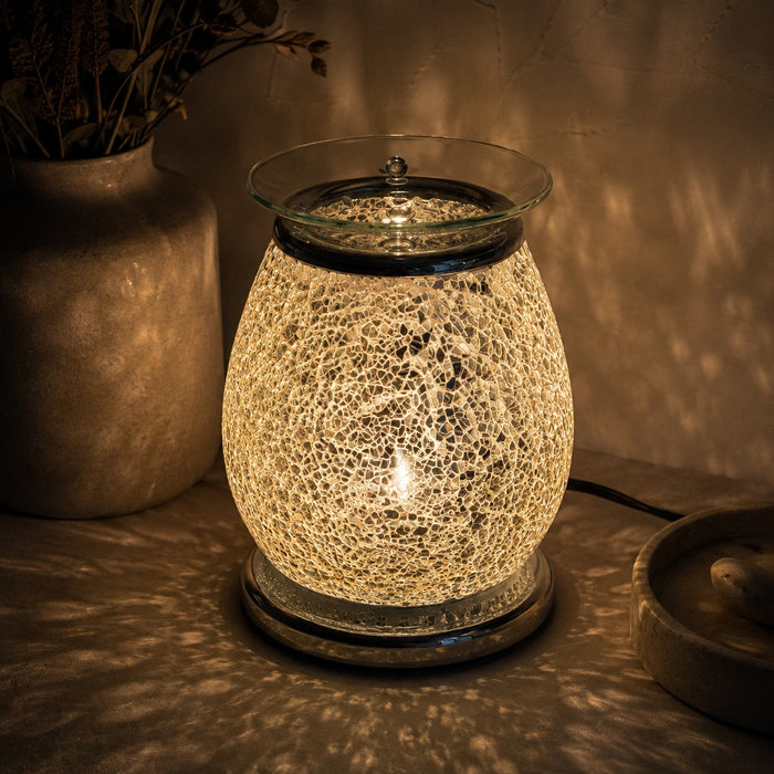 Jupiter Mosaic Electric Touch Lamp Burner lit in the dark