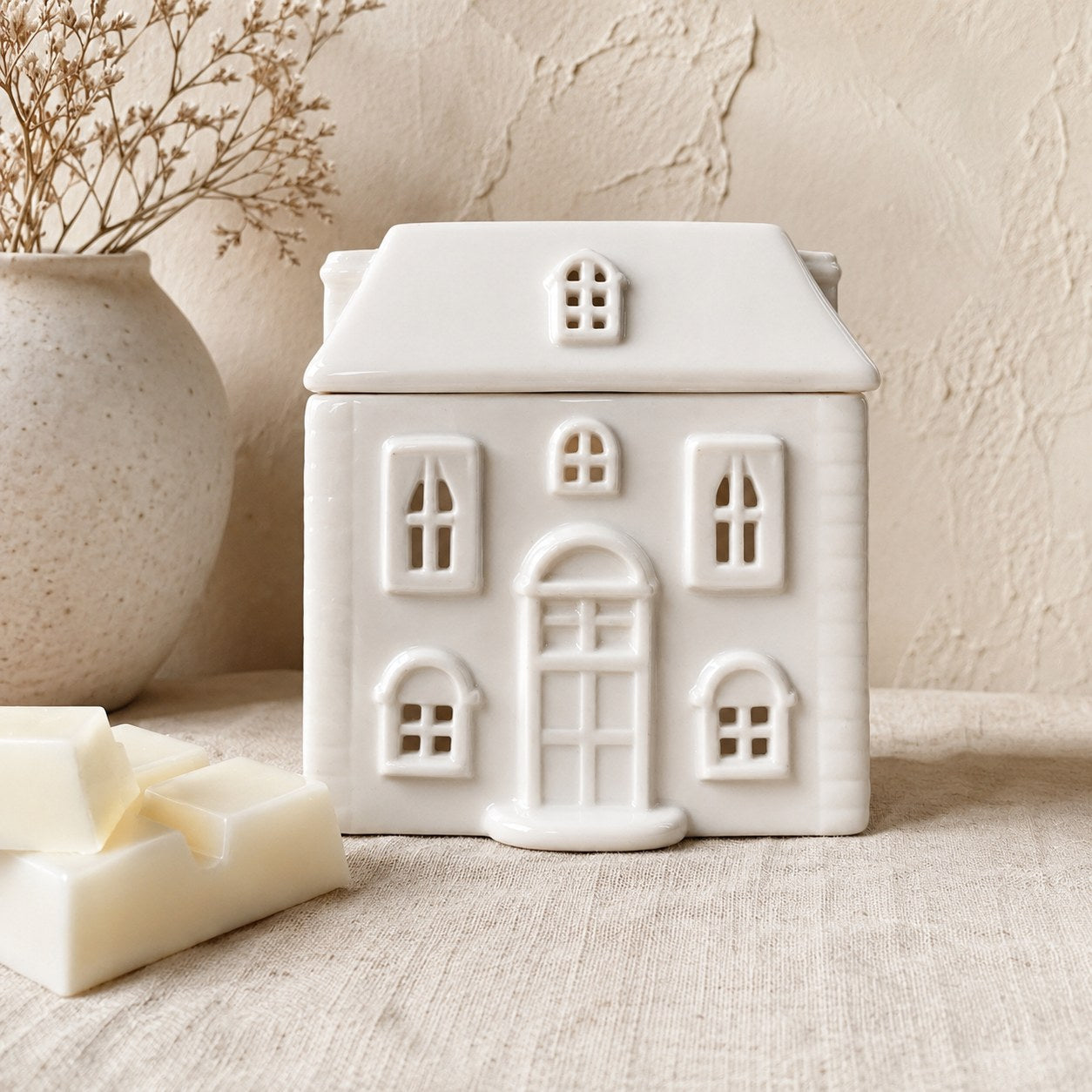 White ceramic house wax burner