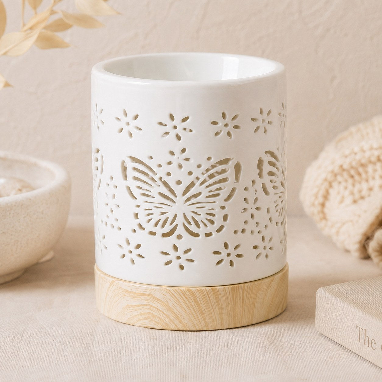 Butterfly ceramic wax burner on wooden base