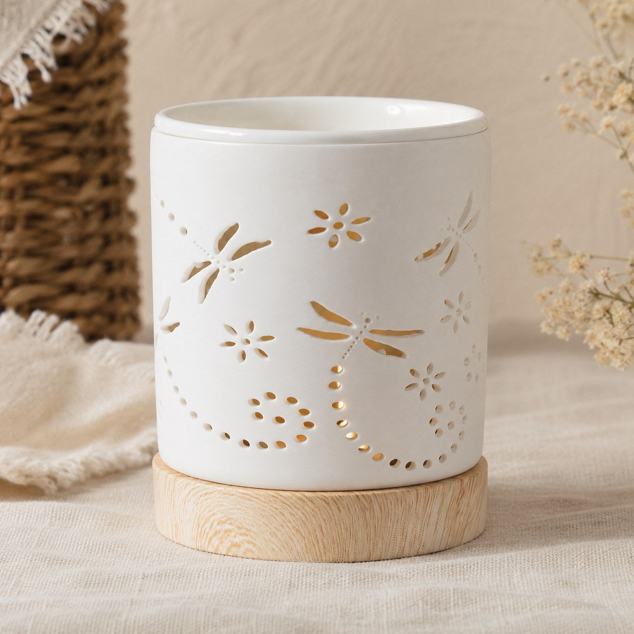 Ceramic dragonfly wax burner on wooden base