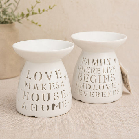 Ceramic wax burner with words cut out design