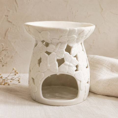 Embossed butterfly wax burner