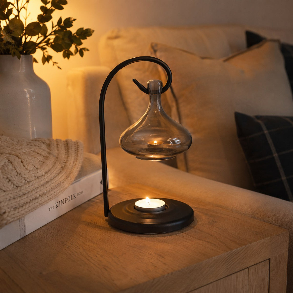 Grey tear drop melter in a cosy living room