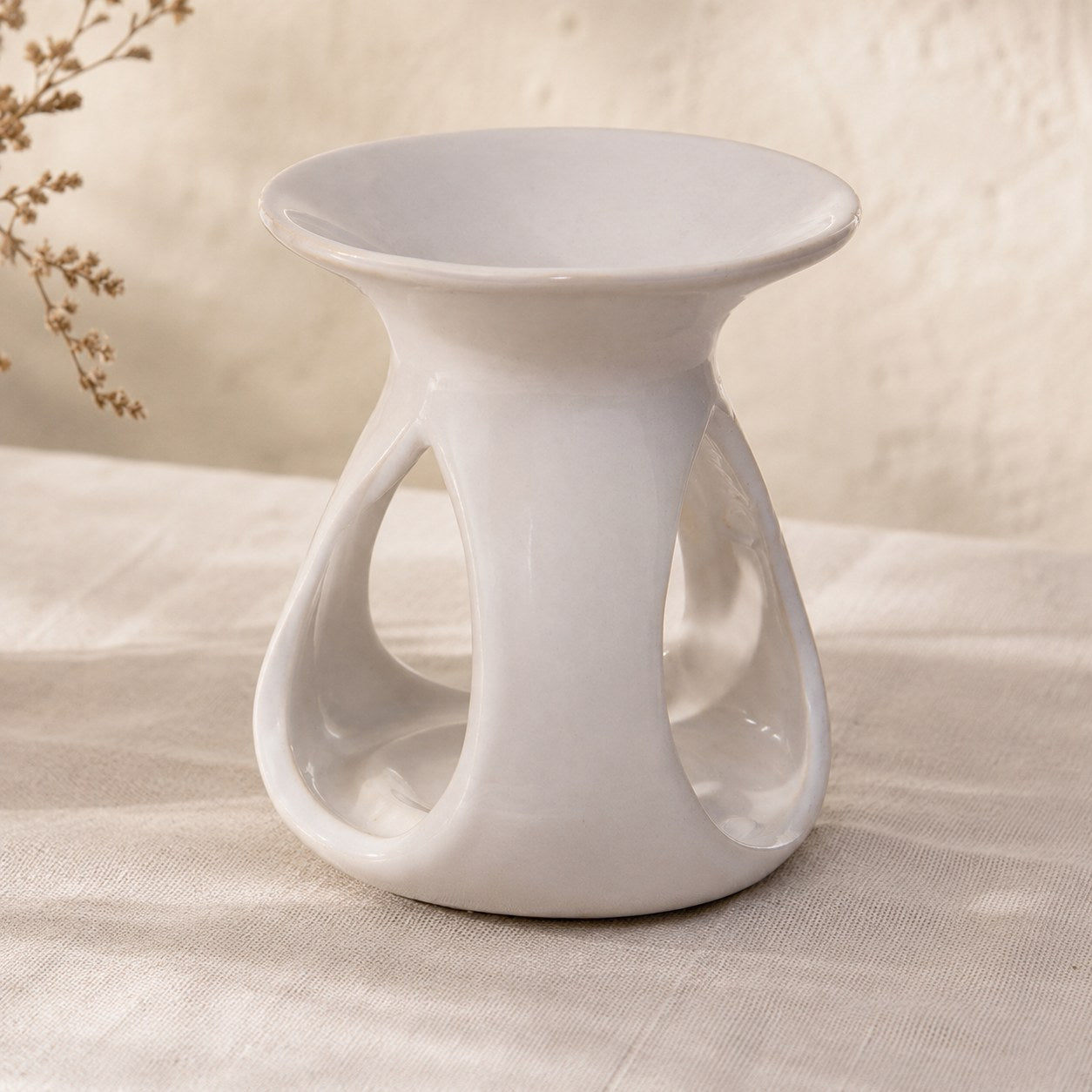 White tear drop ceramic oil and tart burner