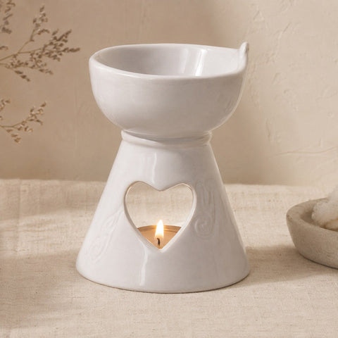 White ceramic heart cutout oil and tart burner