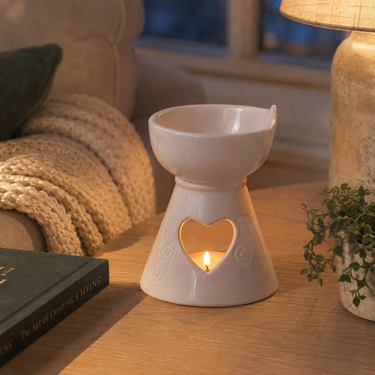 White heart cutout burner in a cosy living room